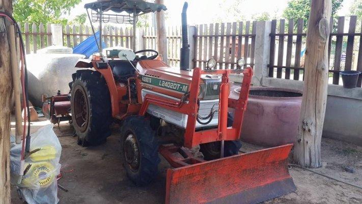 ขายรถแทรคเตอร์ เก่าญี่ปุ่นKUBOTA L2402DT ทน สภาพพร้อมใช้งาน อุปกรณ์ ใบมีดหน้า ผานหลัง โรตารี่ สภาพสวย