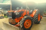 ขายรถไถ Kubota M7040 (4WD) พร้อมดันหน้าและผานตราช้าง สีเดิม เครื่องนิ่มๆครับ