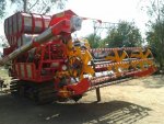ขายรถเกี่ยวข้าวศักดิ์พัฒนาKM56 อุ้ม2.5ตัน เครื่อง6HH1 เทอร์โบ สภาพสวย ตัวเดิน12HT